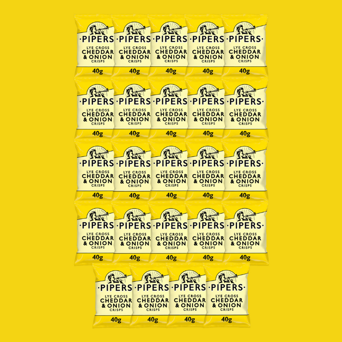 A bowl of crisps showing their golden, hand-cooked texture.