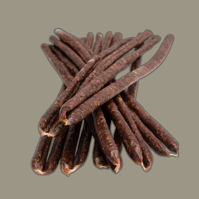 Close-up of the texture of Hunters Chilli Garlic Beef Sticks, emphasizing the visible spices.