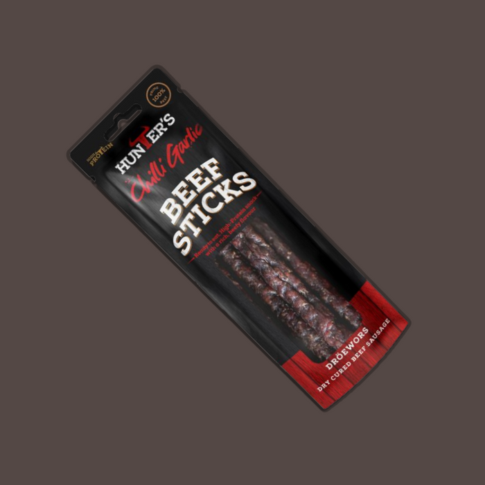 Hunters Chilli Garlic Beef Sticks in an open pack, ready for snacking.