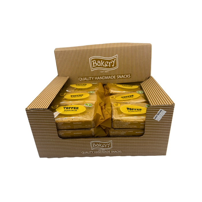 Single RJ Toffee Flapjack 125g unwrapped showing glossy toffee layer over oat base