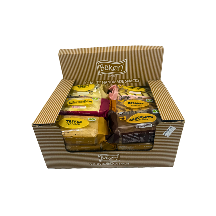 Six RJ Cereal Bars flavours arranged in a row: white chocolate, raspberry, caramel, toffee, chocolate, bakewell