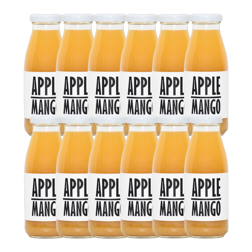 A bottle of Pressuice Apple-Mango Juice with fresh apples and mangoes beside it.