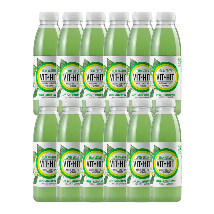 Vit Hit Lean & Green 12-pack displayed with fresh apples and elderflower blossoms.