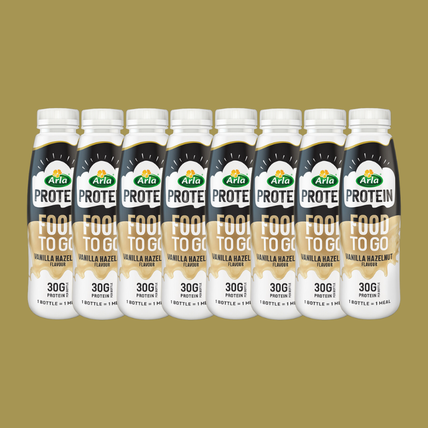 A pack of 8 Arla Protein Vanilla Hazelnut bottles, ideal for meal prep and workouts.