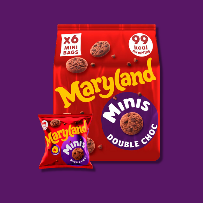 A child enjoying a Jammie Dodger snack from the mini selection pack.
