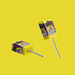 A close-up of unwrapped lollipops showcasing their bright tropical colors.