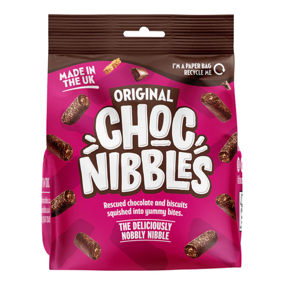 Cardboard box containing 12 individual 135g packs of Chocolate Nibbles Original, branded front panels showing logo and image of bite-size chocolate pieces.