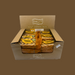 Stack of 24 RJ Caramel Flapjacks multipack next to coffee and fruit