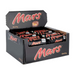 Opened Mars Bar next to a glass of milk on a kitchen counter

