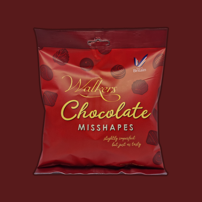 Close-up of a selection of Walkers Misshaped Chocolates, emphasizing the variety of fillings.