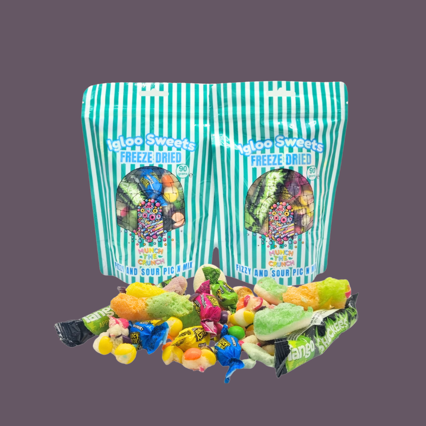 Colorful assortment of Freeze Dried Fizzy & Sour sweets spilling from a blue bag