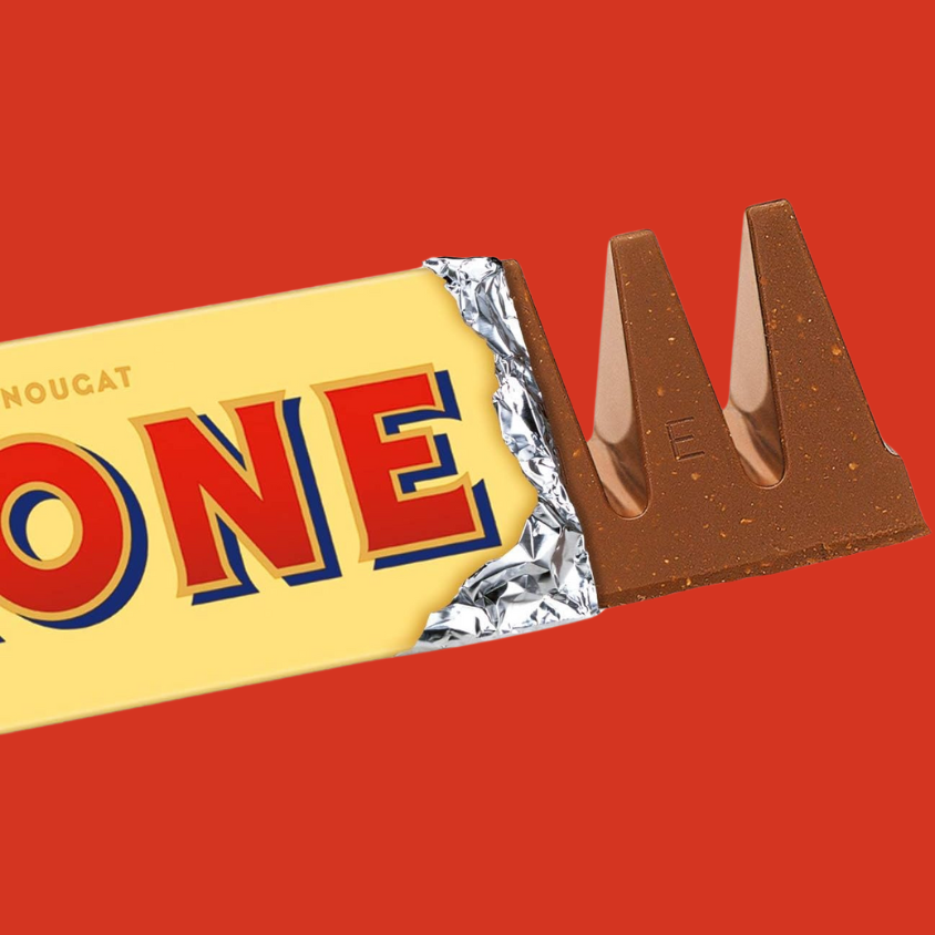 Unwrapped Toblerone bar with honey and almond nougat