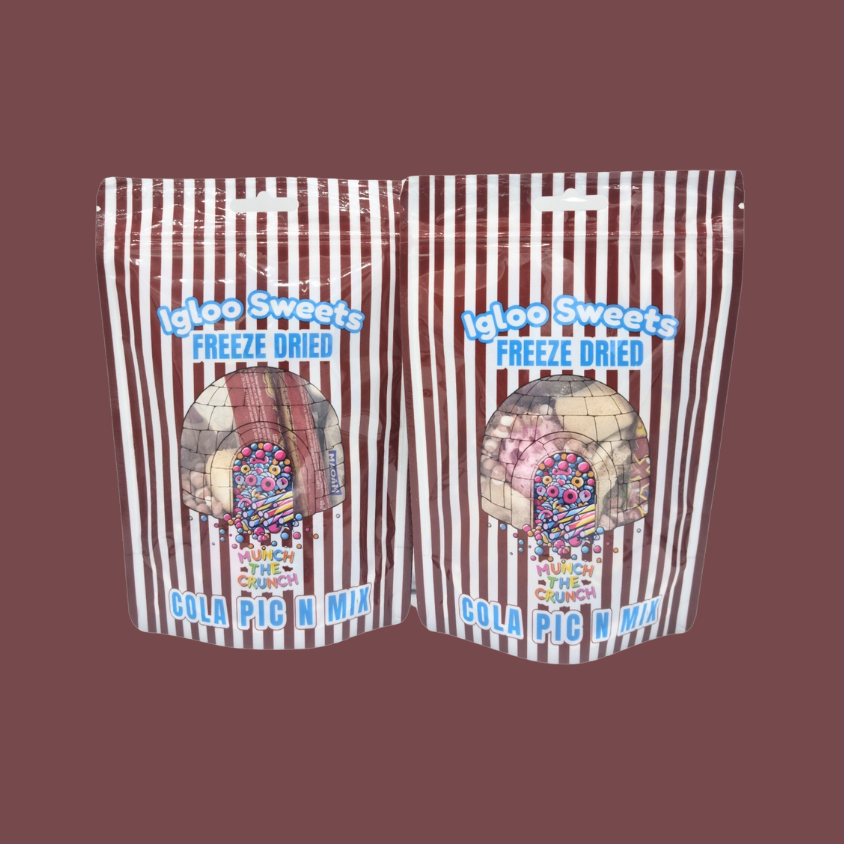 Bag of freeze-dried cola sweets with vibrant party bag setup