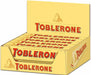 Toblerone 10 x 100g multipack of Swiss milk chocolate bars with honey and almond nougat in retail packaging showing the logo